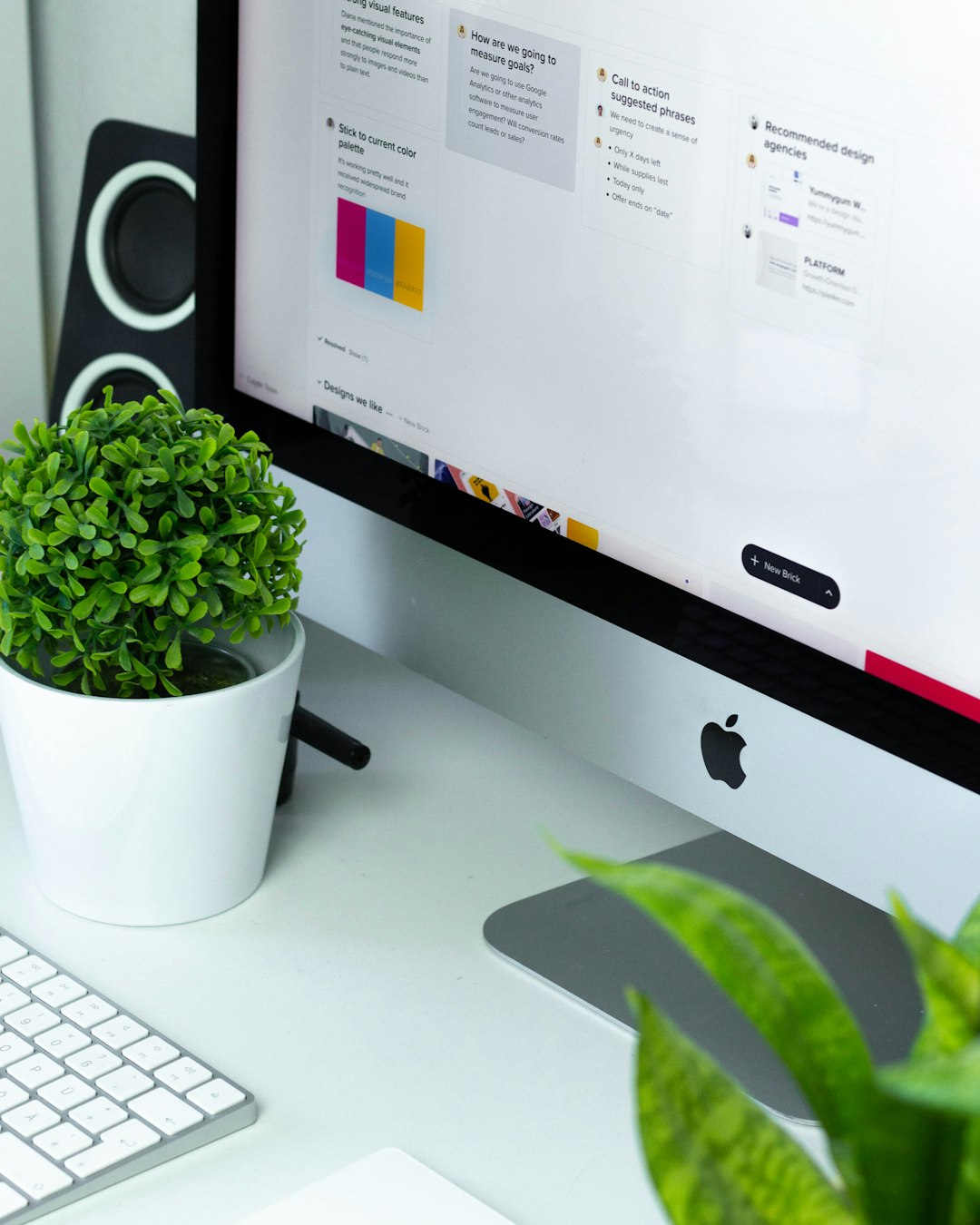iMac with plants on a futuristic desk